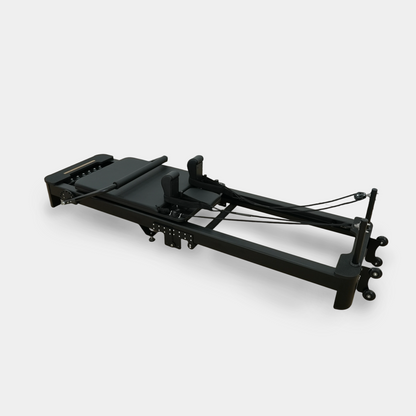 Foldable Aluminum Pilates Reformer | Black & White