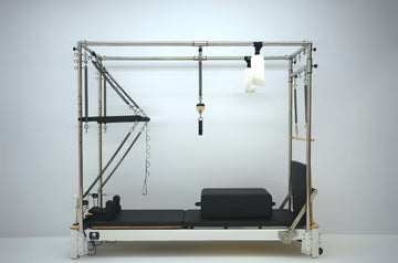 Core Collab Queen Cadillac Pilates Reformer, full-body rehabilitation equipment, front view